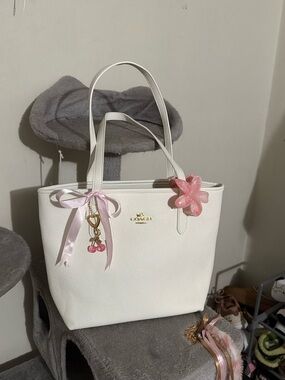 Coach White Pebbled Leather Tote with Pink Ribbon and Flower Charm